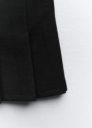 Короткая юбка с бантовыми складками9 фото