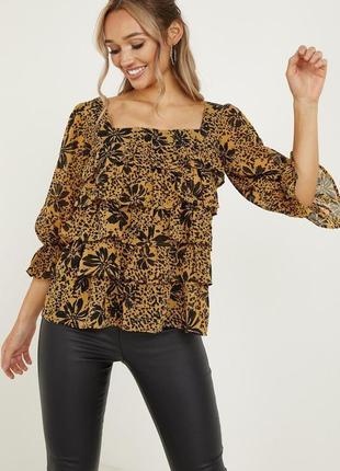 Легкая шифоновая блуза в цветочный принт с рюшами3 фото