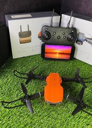 Квадрокоптер з камерою на радіоуправлінні "skysprint" оранжевий. на пульті радіокерування, на акумуляторі1 фото