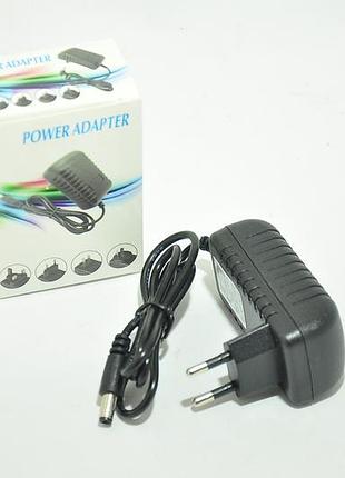 Блок живлення зарядний пристрій 12v 1a 5.5*2.5mm2 фото