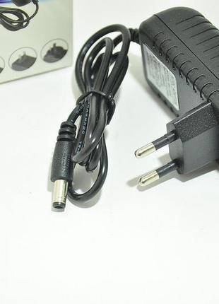 Блок живлення зарядний пристрій 12v 1a 5.5*2.5mm3 фото