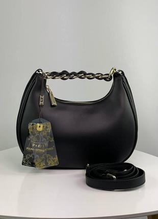 Маленькая черная женская сумка итальянская из натуральной кожи.