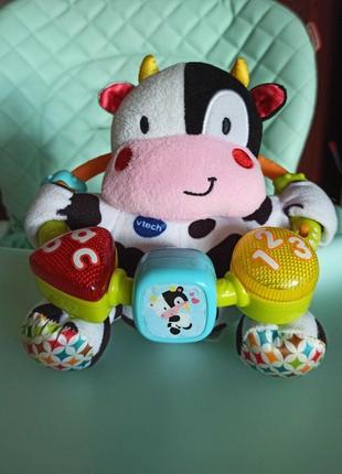 Детская развивающая музыкальная игрушка коровка