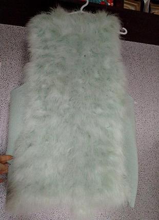 Шикарний жилетз лебяжого пуху