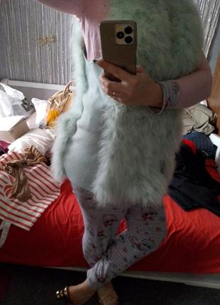 Шикарний жилетз лебяжого пуху