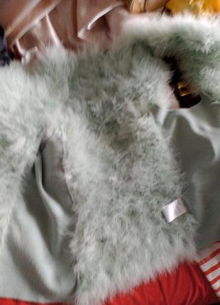 Шикарний жилетз лебяжого пуху