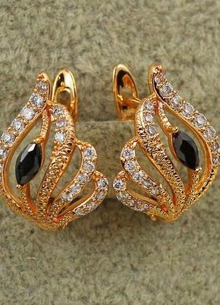 Сережки xuping jewelry джин з чорними каменями 1,7 см золотисті1 фото