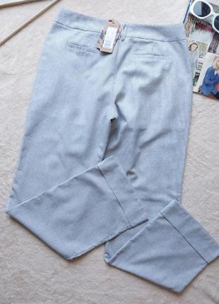 Нові жіночі літні брюки europa92 хорватія  l 48р., льон з бавовною, білі в смужку2 фото