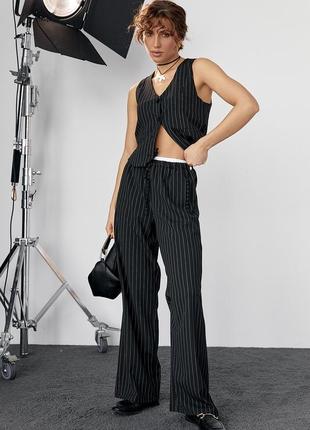 Женские брюки в полоску с резинкой на талии - черный цвет, l7 фото