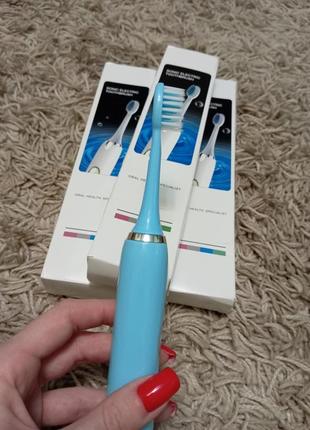Електрична зубна щітка2 фото