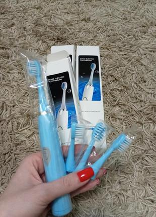 Електрична зубна щітка5 фото