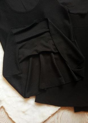 Черная фактурная блуза футболка с баской воланом снизу стрейч вырезом декольте батал большого размер9 фото