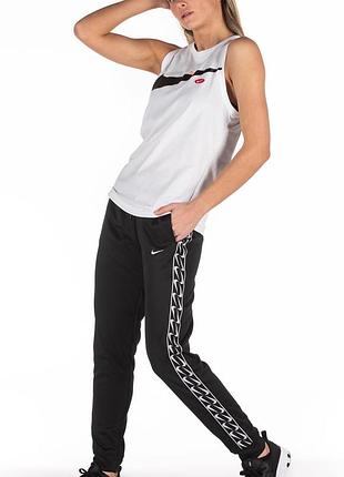 Спортивні штани nike з лампасами чорні спортивки найк джогери на манжеті7 фото