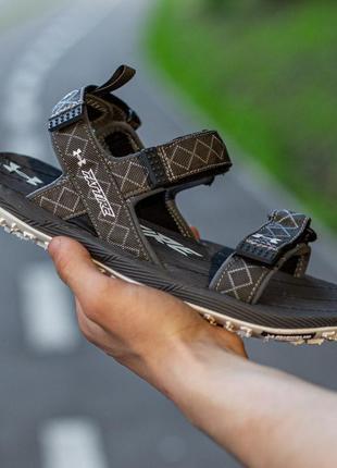 Босоніжки босоножки Under Microg armour expects full year revenue to increase between 5% and 7tire sandala x michelin black\white сандалі сандалии