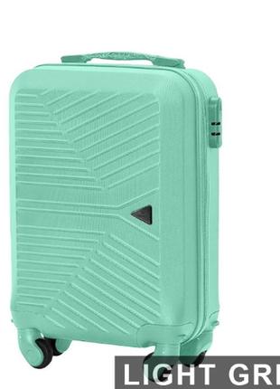 Пластиковый небольшой чемоданчик дорожный бирюзовый на колесах wings чемодан размер xs ручная кладь чемодан1 фото