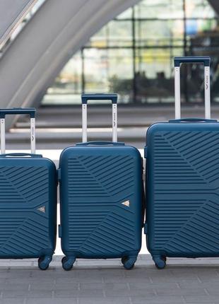 Пластикова дорожня валізка невелика синя на колесах wings якісна валіза розмір xs ручна поклажа9 фото