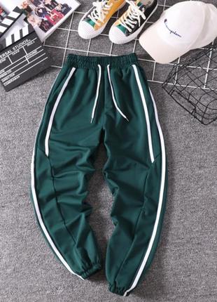 Спортивні штани штани джоггеры з смужками adidas nike puma reebok8 фото