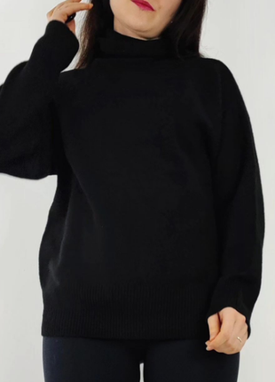 Об'ємний чорний светр з високим коміром primark3 фото