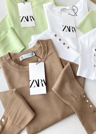 Светр з гудзиками на рукавах zara