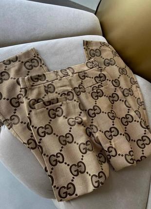 Брюки в стилі gucci