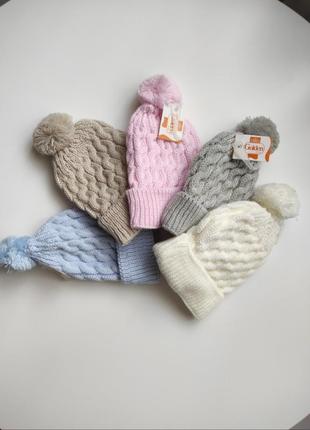 В'язані  демісезонні шапочки для  новонароджених  0-6 міс2 фото
