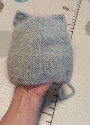Дитяча зимова шапка тепла в'язана ручна робота на зав'язках з вушками