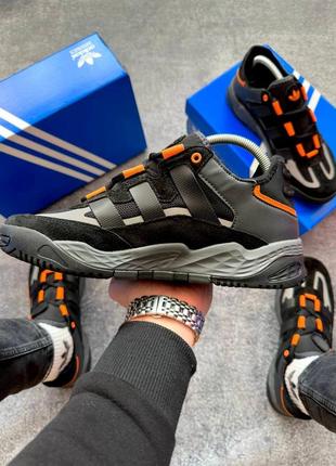 Актуальні чорні чоловічі кросівки з помаранчевим натуральні чоловічі кросівки з оранжевим чоловічі кросівки niteball adidas кросівки4 фото