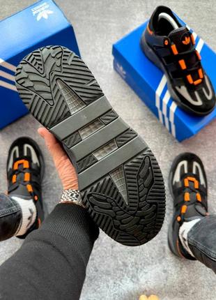 Актуальні чорні чоловічі кросівки з помаранчевим натуральні чоловічі кросівки з оранжевим чоловічі кросівки niteball adidas кросівки5 фото