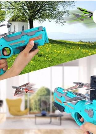 Детский игрушечный пистолет с самолетичками air battle