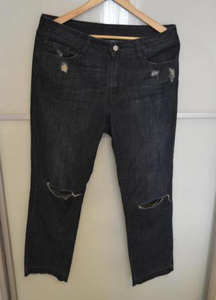 Трендовые джинсы с необработаными краями и порезами на коленках от mango1 фото