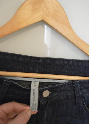 Трендовые джинсы с необработаными краями и порезами на коленках от mango2 фото