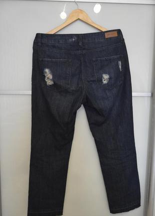 Трендовые джинсы с необработаными краями и порезами на коленках от mango3 фото