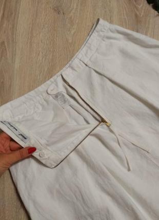 Льняная белая пышная юбка трапеция миди с карманами10 фото