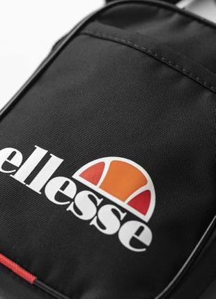 Мужская спортивная барсетка ellesse через плечо тканевая черная мессенджер повседневный9 фото