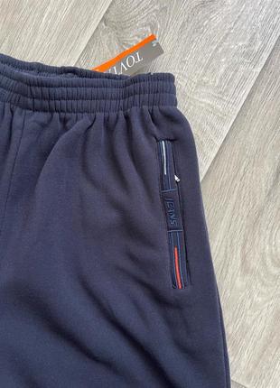 Теплые спортивные штаны на манжете мужские теплые однотонные брюки на резинке флис осень зима3 фото