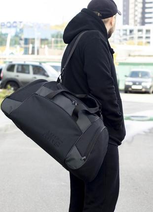 Спортивна сумка nike з тканини чорна для тренажерного залу та поїздок дорожня чоловіча на 55 літрів9 фото