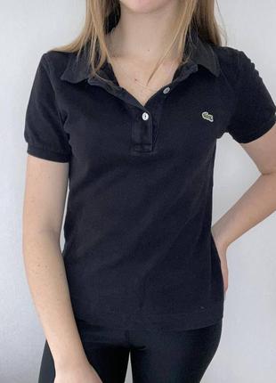 Поло черного цвета lacoste