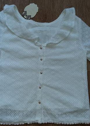 Гипюровая блузка с пуговицами на спине с этикеткой3 фото