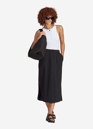 Бавовняна спідниця adidas premium essentials midi