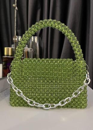 Зеленая сумочка из круглых акриловых бусин.5 фото