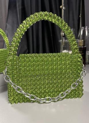 Зеленая сумочка из круглых акриловых бусин.2 фото