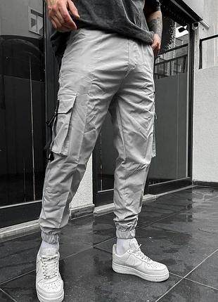 Брендовые штаны stone island