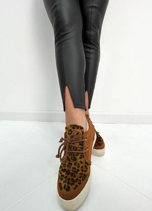 Жіночі брюки-легінси з розрізами3 фото