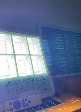 Продам led лампу-прожектор на сонячній панелі 300вт2 фото