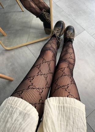 Мегакрути стильные трендовые колготки в сетку с принтом gg