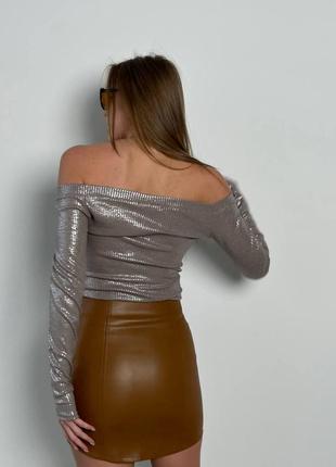 Кожаная короткая юбка с регулирующим шнурком спереди6 фото