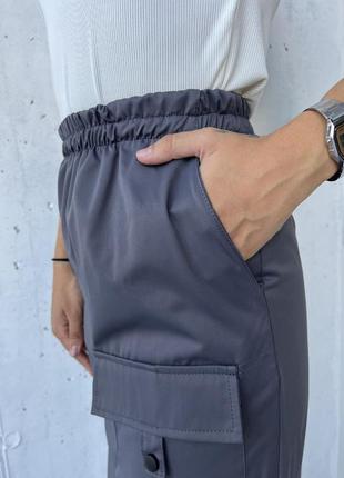 Плащевая длинная юбка карго с накладными карманами,не утеплена.3 фото