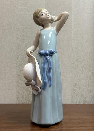 Фарфорова статуетка lladro «дівчина з зачіскою».
