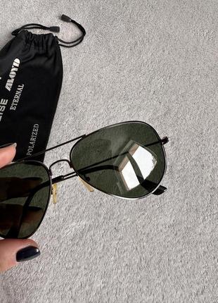 Тёмно-зеленые поляризационные солнцезащитные очки в металлической тонкой оправе5 фото