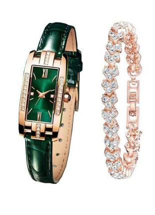 Красивые женские наручные часы и браслет